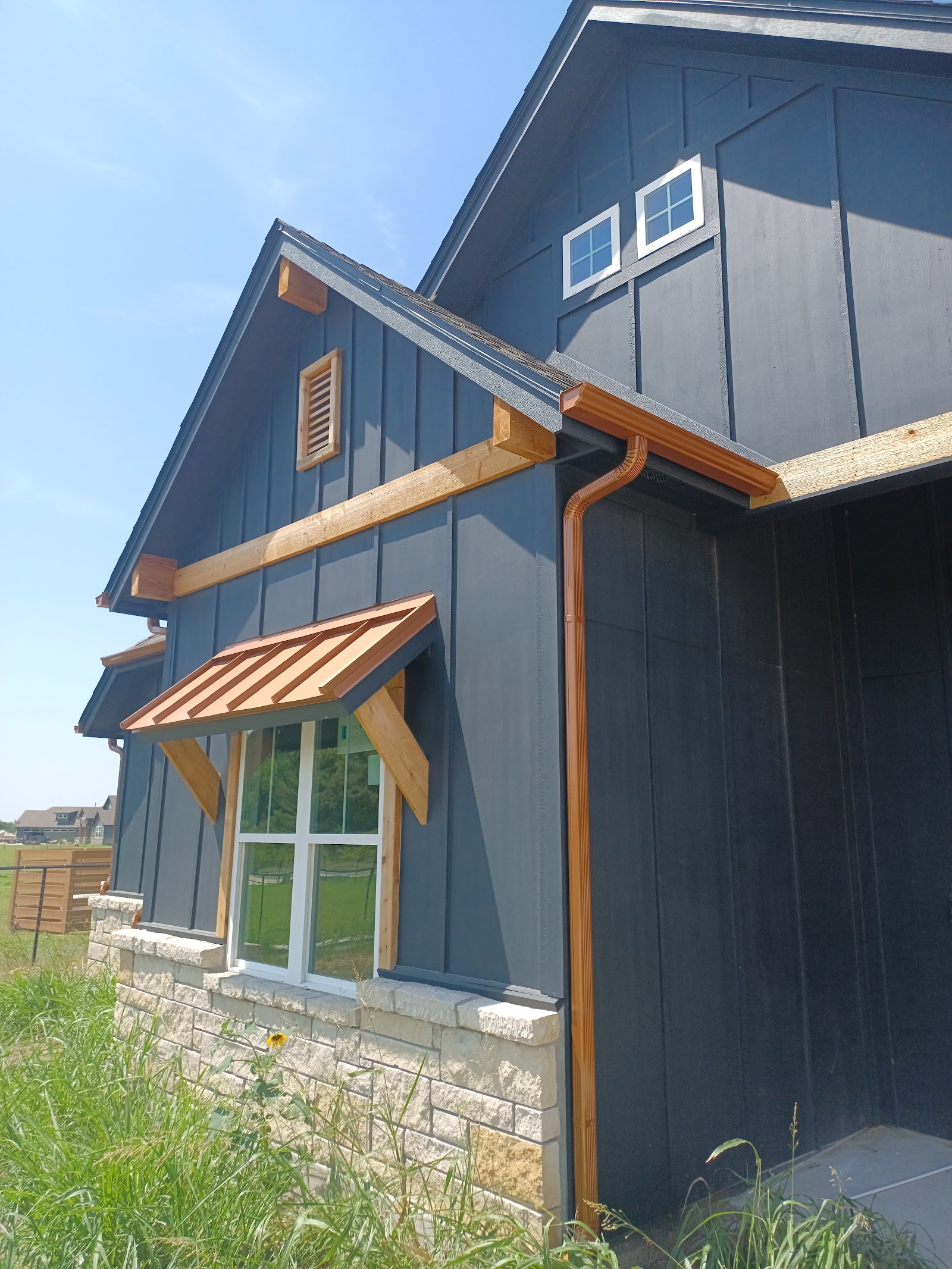 Custom Flow seamless rain gutters at work